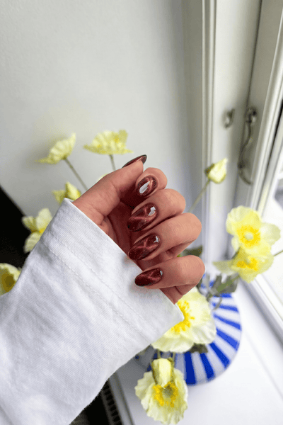 Rusty Cat Eye  · 323 - Hand